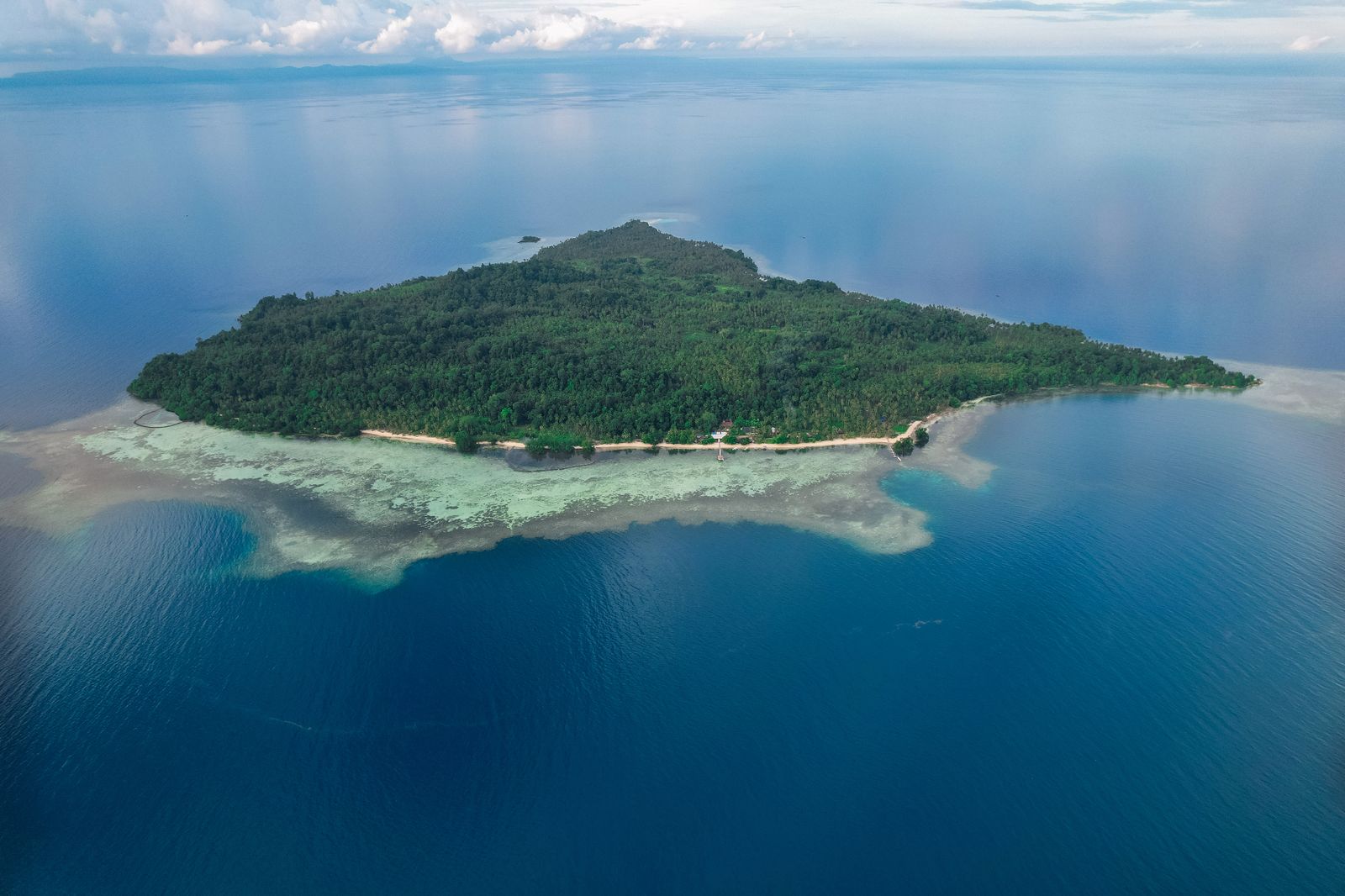Aerial view of Buka Buka Island in the Togean archipelago, where Reconnect sits on the south shore